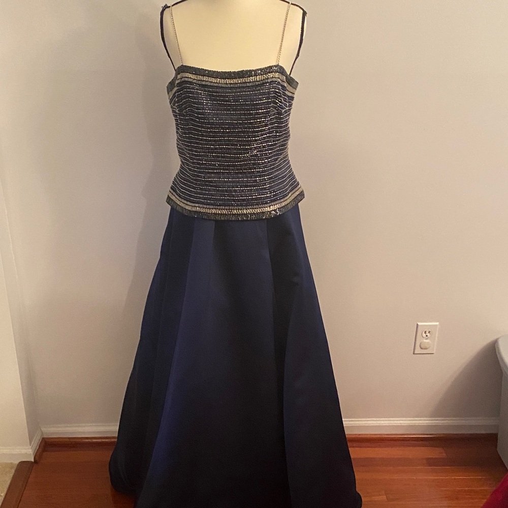 Beautiful dress dark blue and beaded top. Gown perfect for prom or galas.